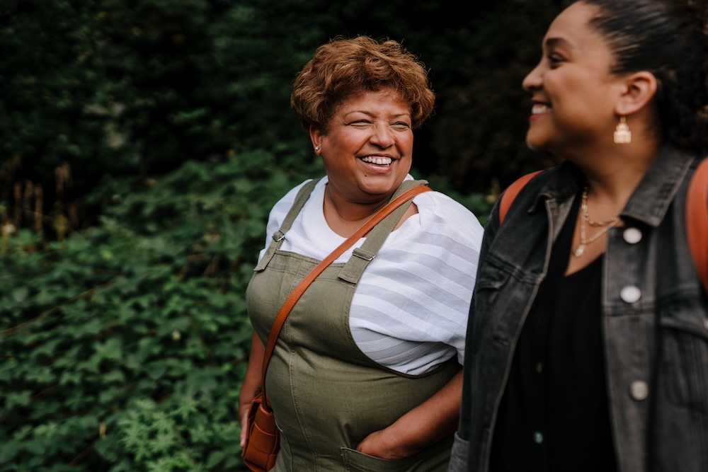 Women smiling outdoors