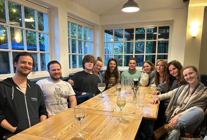The malpetti lab group members at social dinner