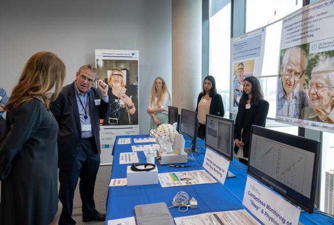 Researcher talking to MP