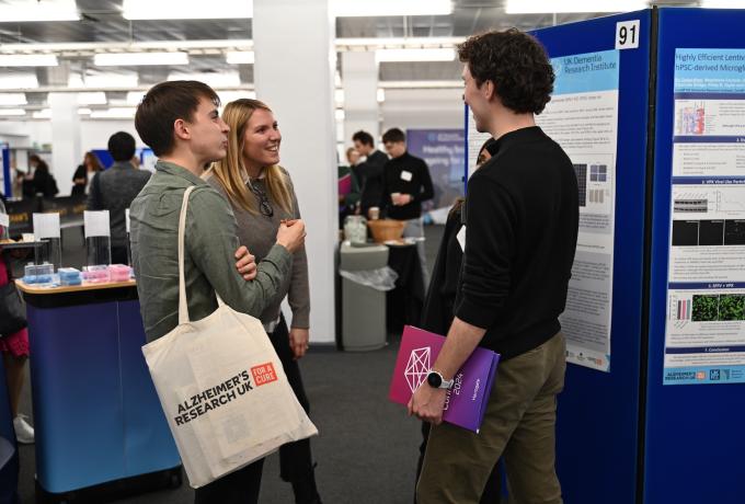 Three people chatting together