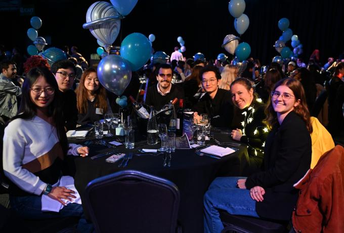 UK DRI members at evening meal. Sitting down for dinner.