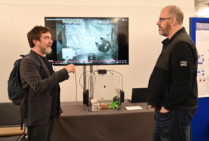 Two people chatting together