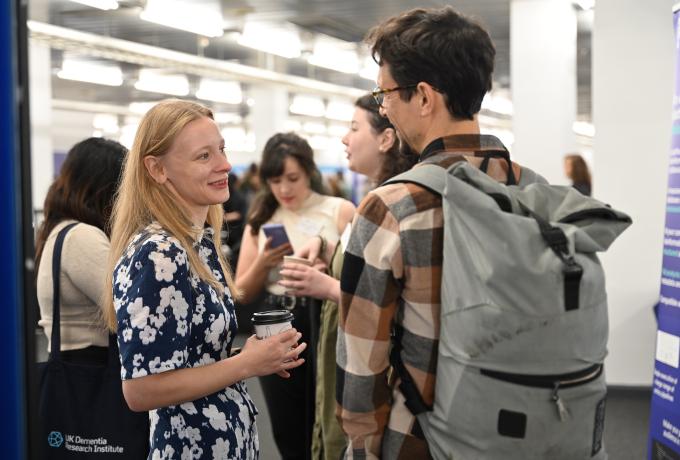 Two people chatting together