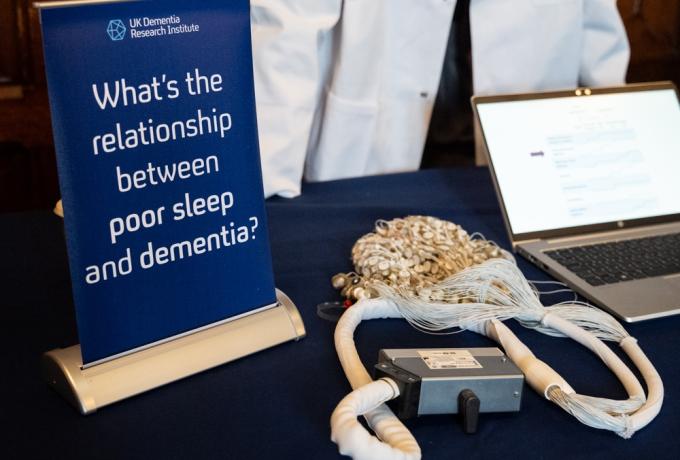 Stand at event discussing the link between sleep and dementia