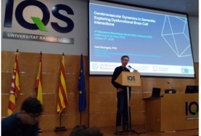 Axel Montagne speaking on stage