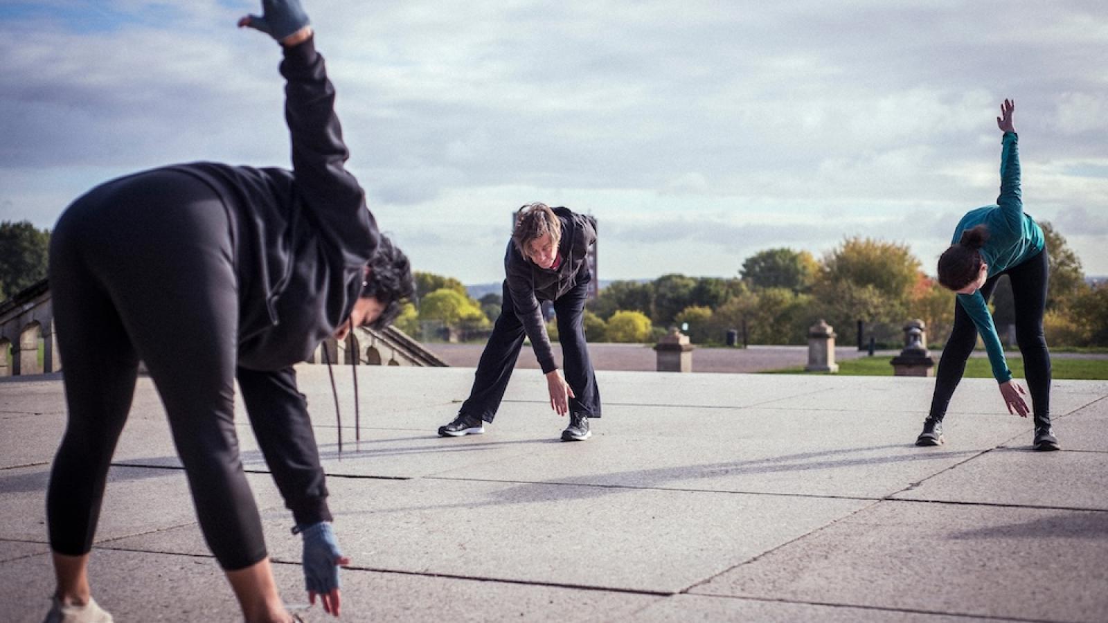 People stretching outside before a run