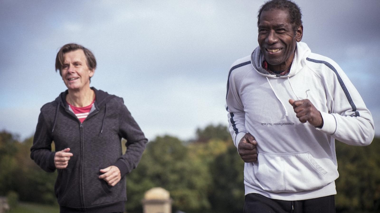 Two men running outside