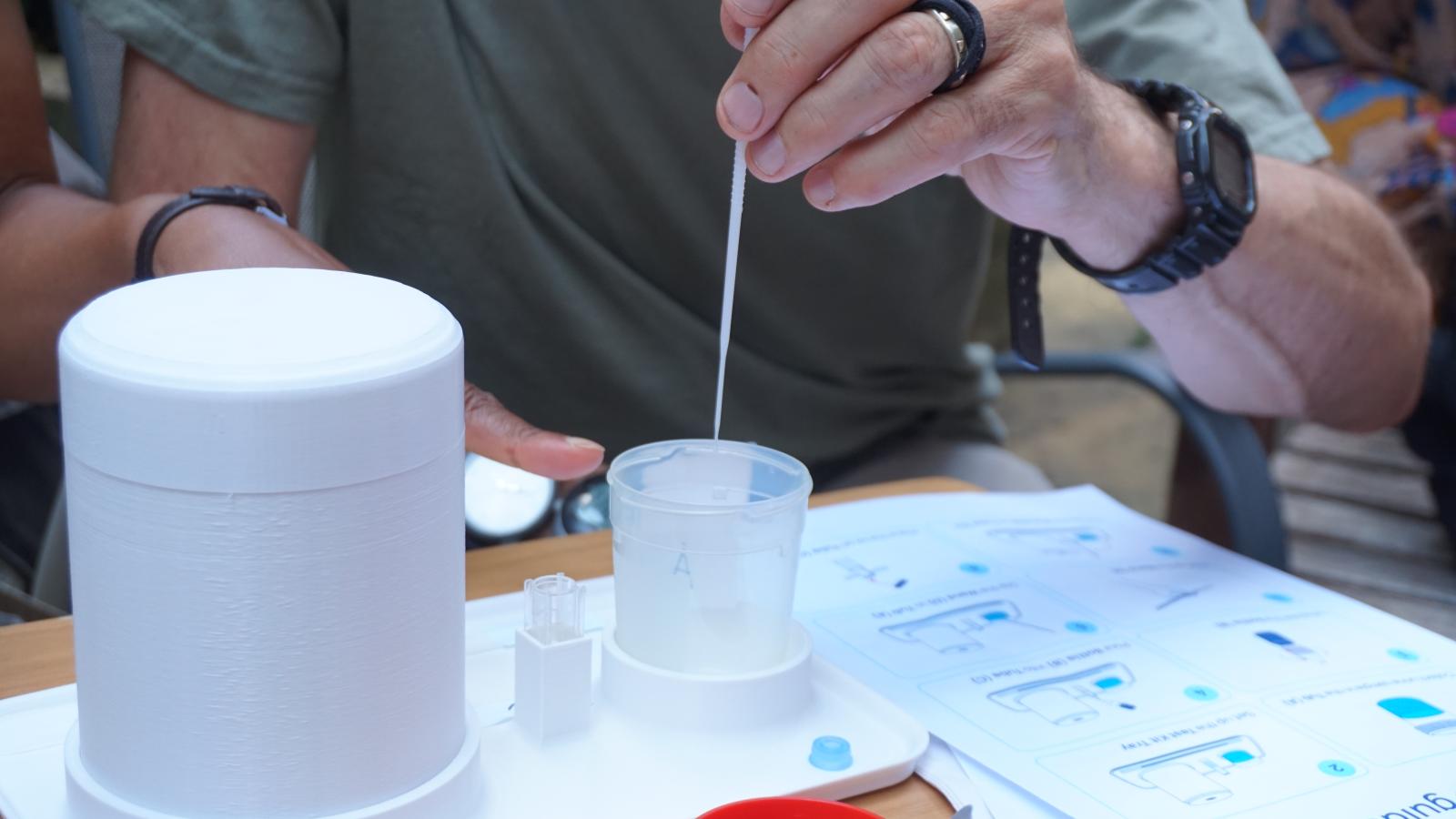 Image showing a scientist using a pipette 