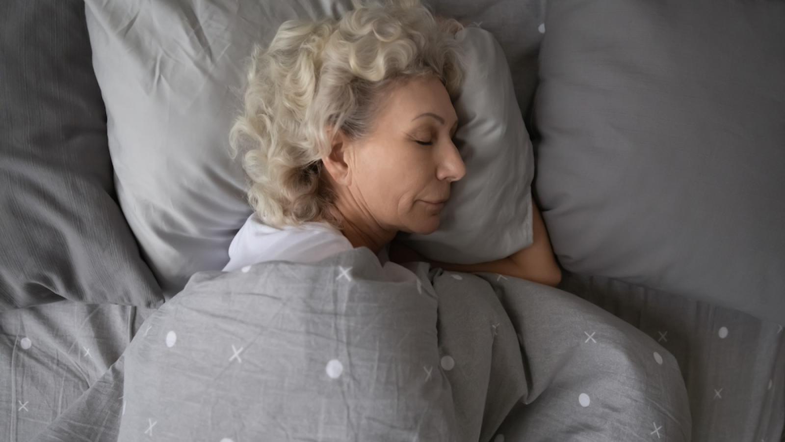 Older lady sleeping in bed