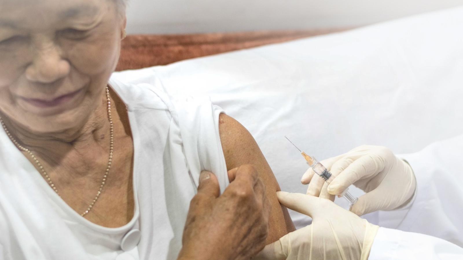 Woman receiving a vaccine injection