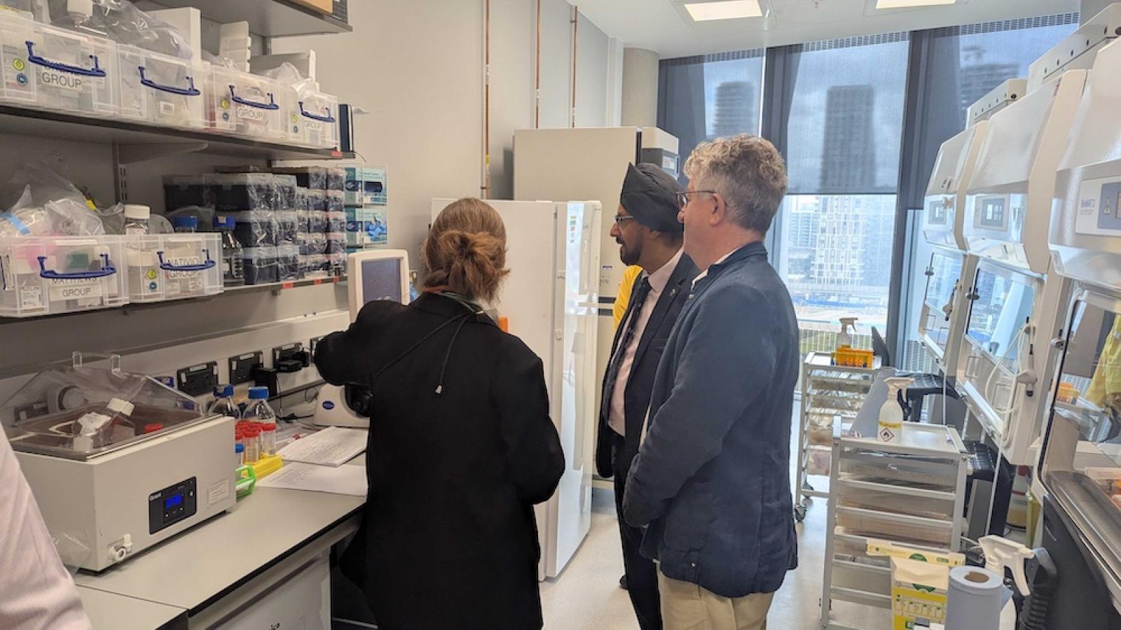 Warinder Juss, Dr Jennifer Podesta and Prof Bill Wisden tour the lab