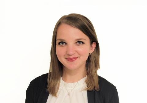 Headshot of Cara Croft, young female with medium length light brown hair