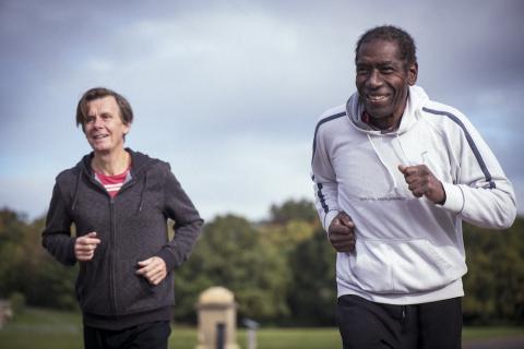 Two men running outside