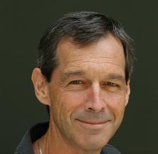 Smiling male with dark hair