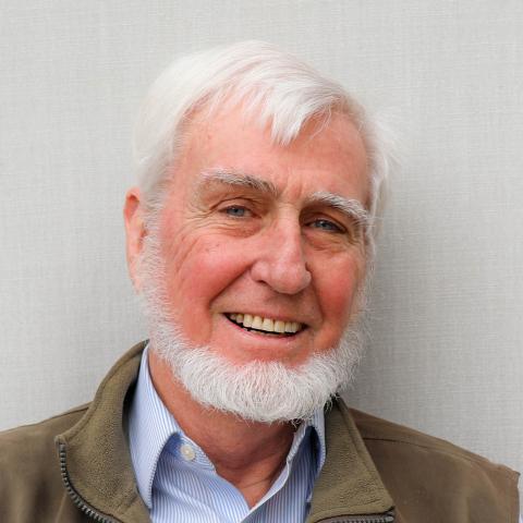 John O'Keefe, male with white hair and a white beard