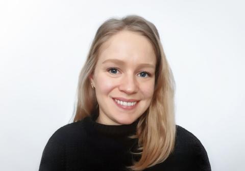 Smiling female with long blonde hair