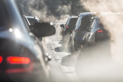 Traffic jam with exhaust fumes 