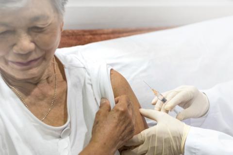 Woman receiving a vaccine injection