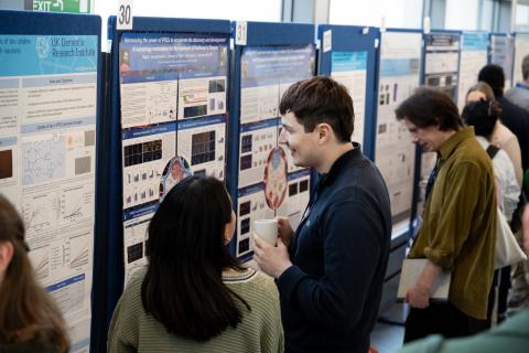 Researchers at a poster