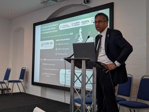 Siddharthan Chandran speaking at the CURE-ND AI symposium