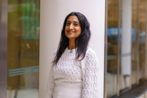 Smiling female in white jumper