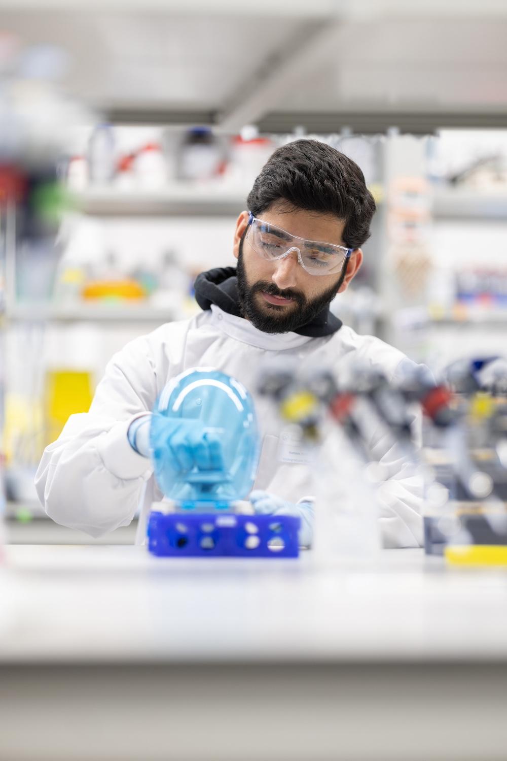 Scientist at a lab bench