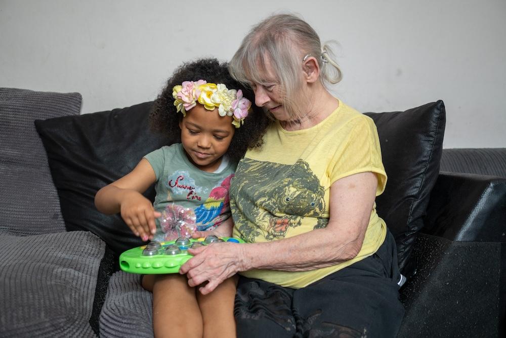 Woman sitting with child