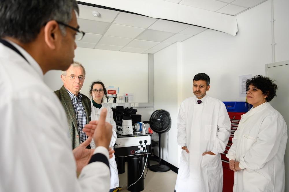 Scientists showcase their research to the Health Minister