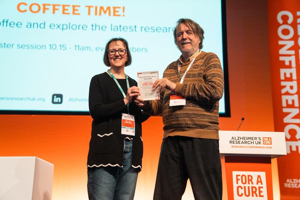 Tara receiving her award